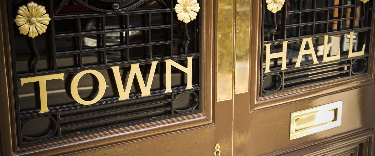 close up of the doors to a local government town hall